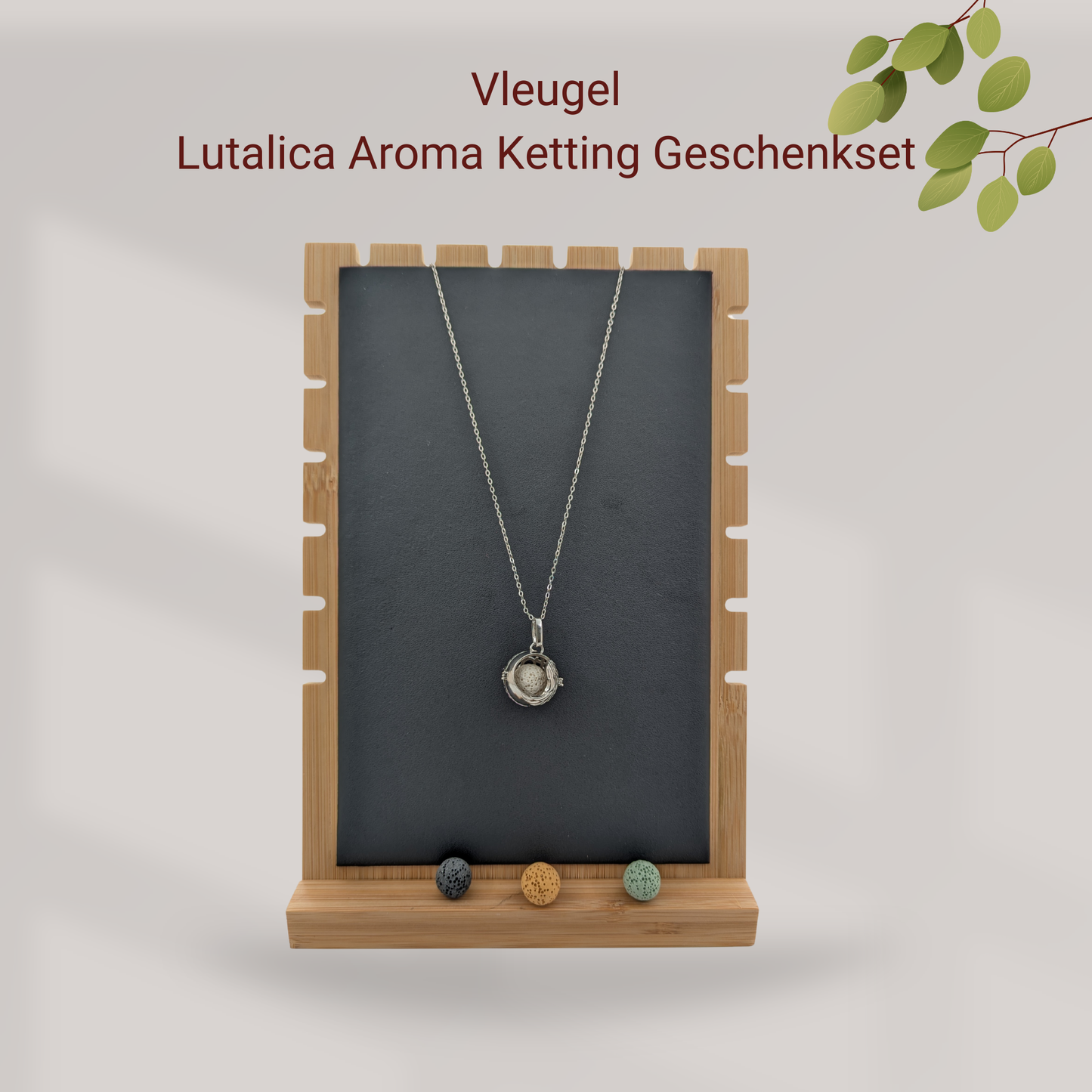 Aroma Necklace with Wing-shaped Pendant including 4 lava stones. | Packaged in a luxurious jewelry box
