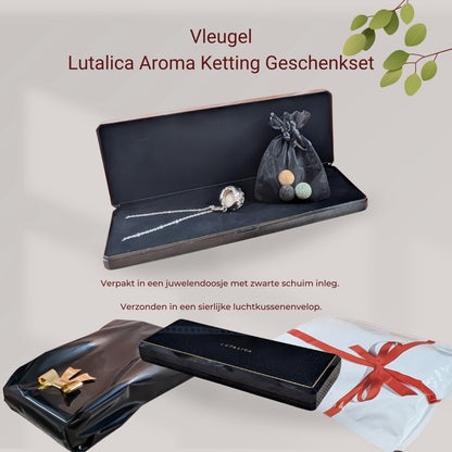 Aroma Necklace with Wing-shaped Pendant including 4 lava stones. | Packaged in a luxurious jewelry box