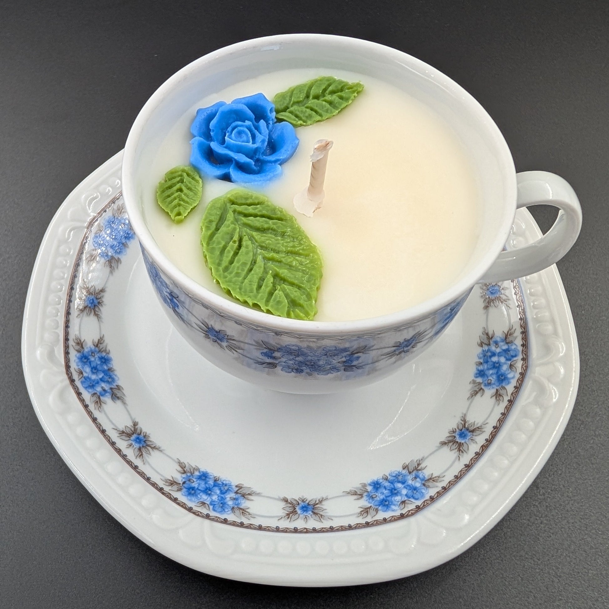 scented candle presented in an authentic Bavaria Mitterteich cup and saucer, marked with the original backstamp.