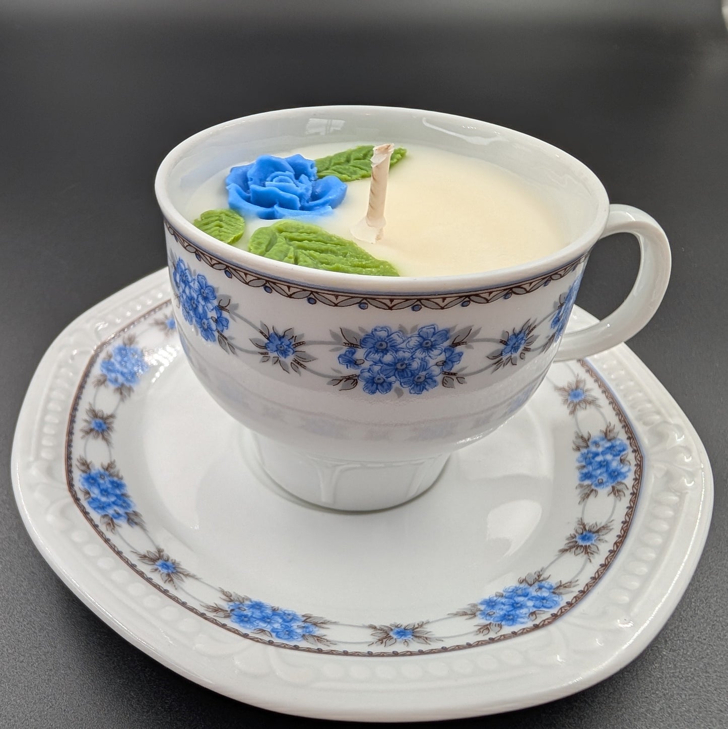 scented candle presented in an authentic Bavaria Mitterteich cup and saucer, marked with the original backstamp.