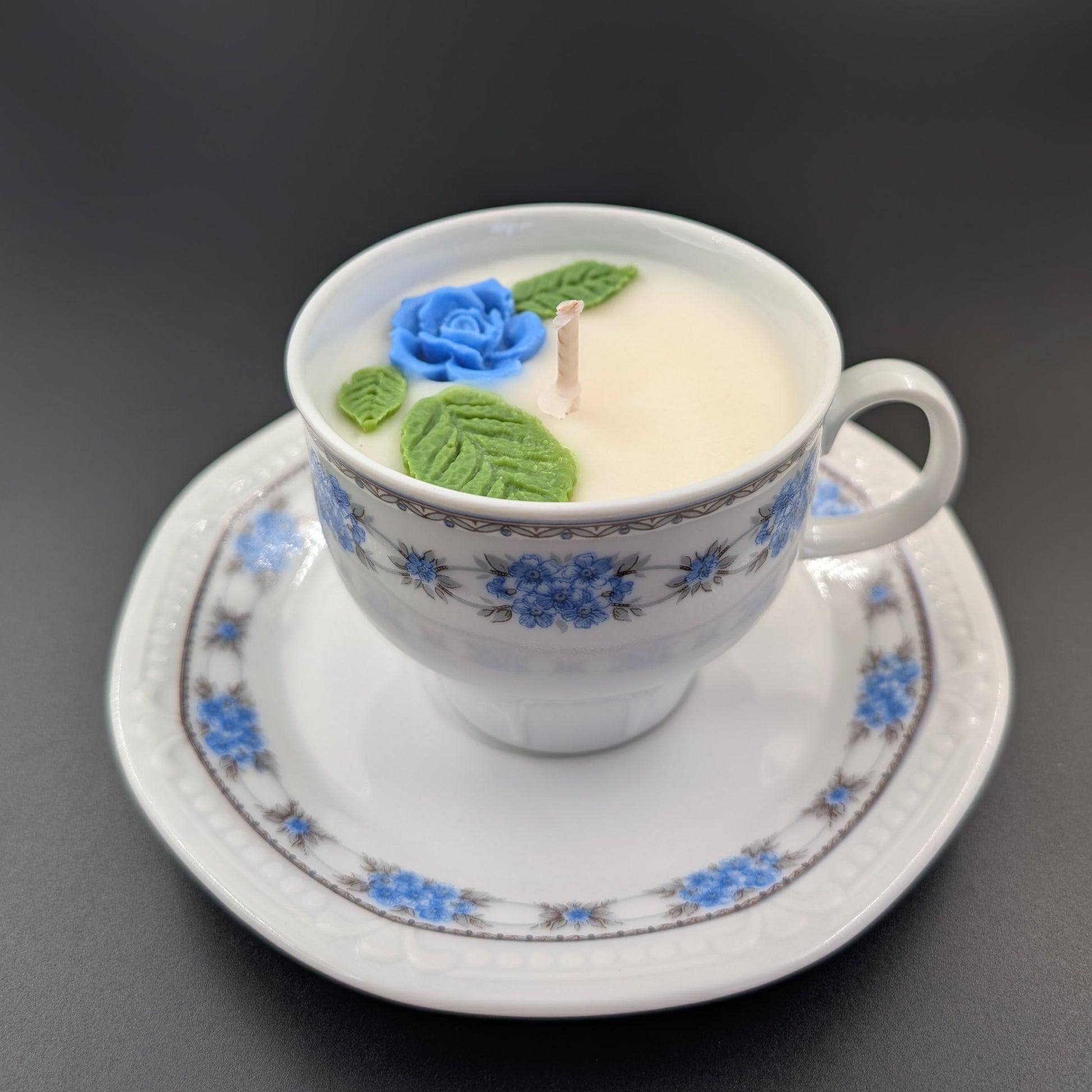 scented candle presented in an authentic Bavaria Mitterteich cup and saucer, marked with the original backstamp.