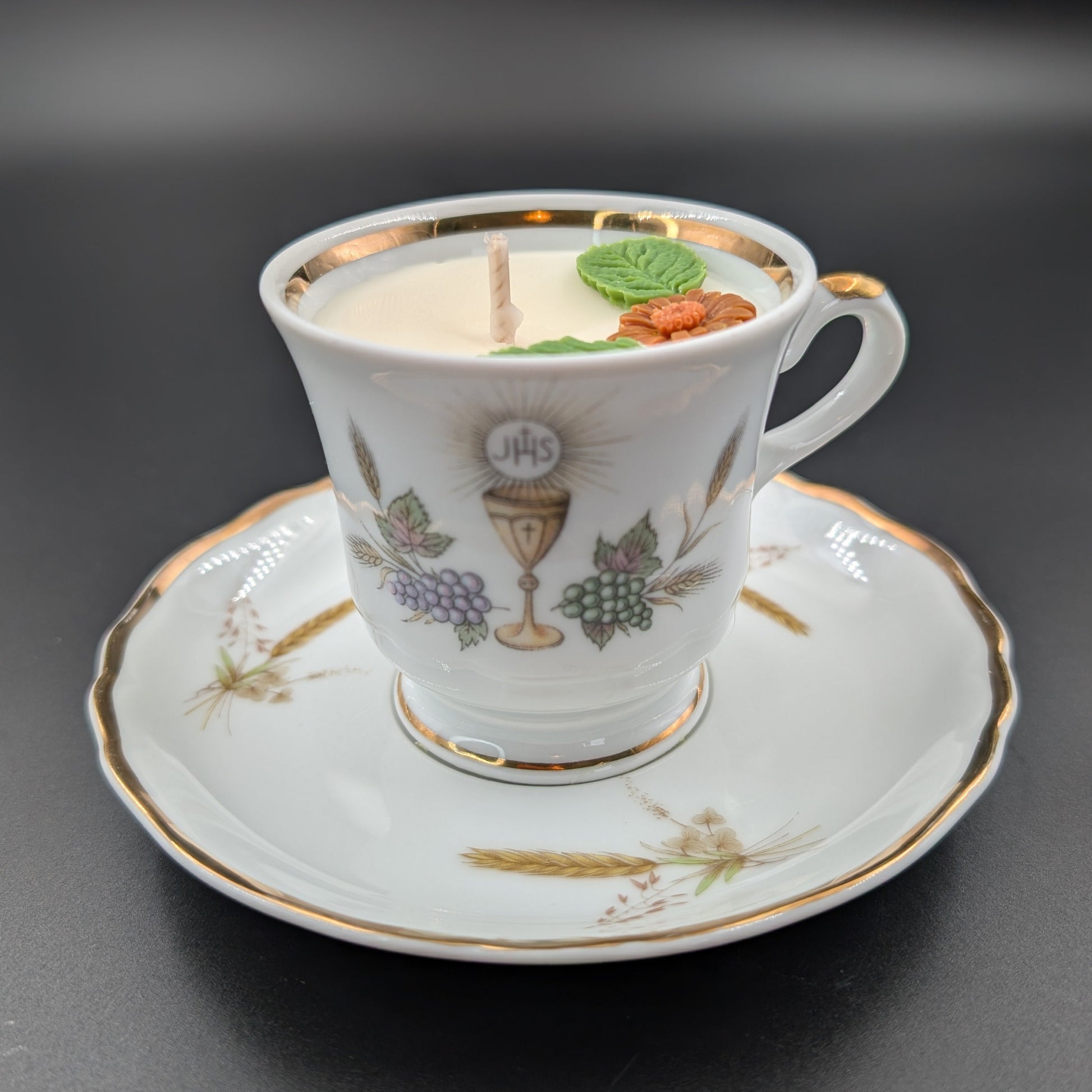 scented candle presented in an authentic Bavaria Tirschenreuth cup and saucer, marked with the original backstamp. 