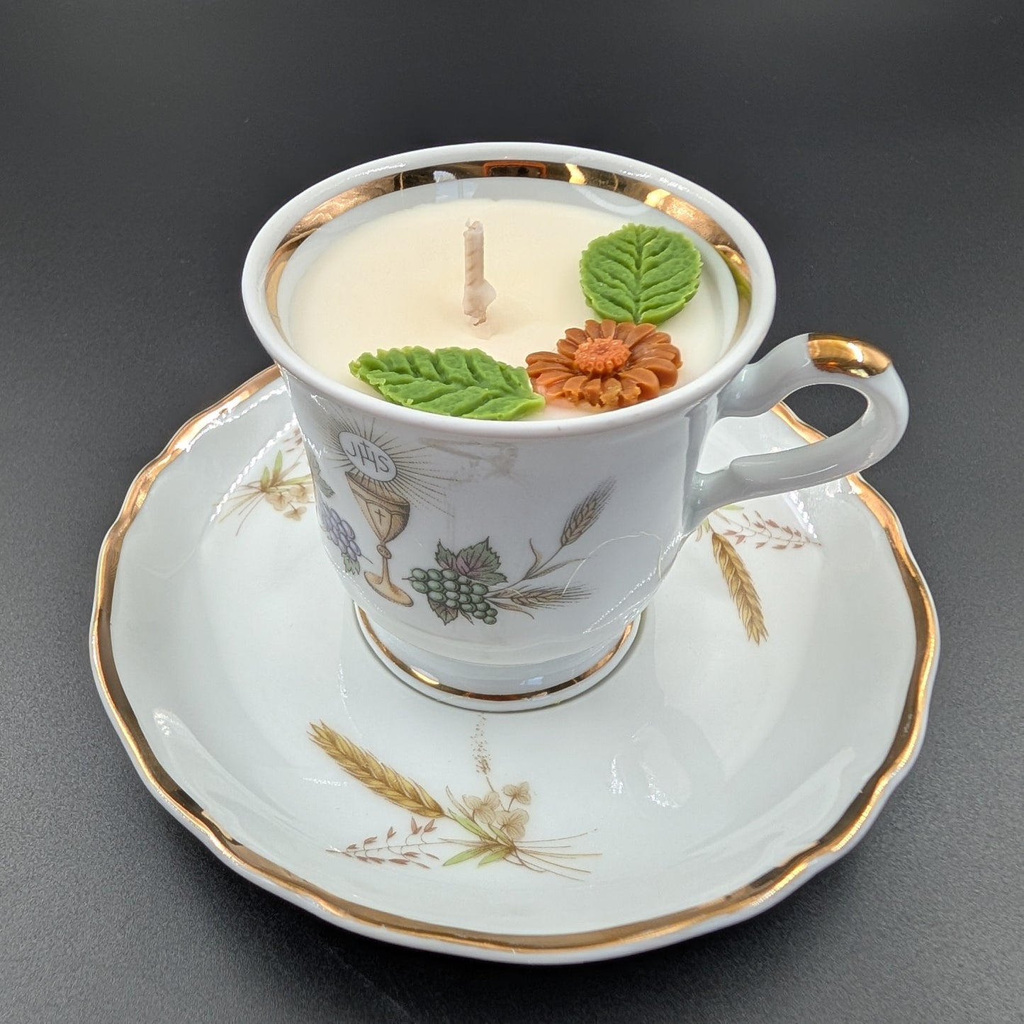 scented candle presented in an authentic Bavaria Tirschenreuth cup and saucer, marked with the original backstamp. 