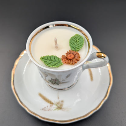 scented candle presented in an authentic Bavaria Tirschenreuth cup and saucer, marked with the original backstamp. 
