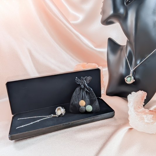 Aroma Necklace with Wing-shaped Pendant including 4 lava stones. | Packaged in a luxurious jewelry box