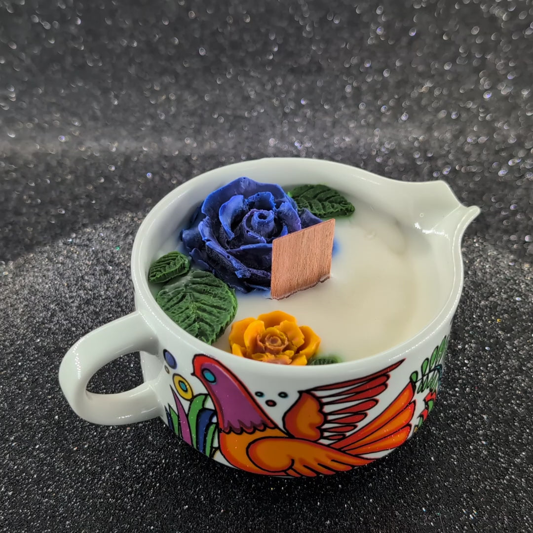 Vintage Villeroy & Boch Acapulco creamer. This scented candle is poured into an authentic Villeroy & Boch Acapulco creamer, marked “Made in Luxembourg” and featuring the iconic blue dove motif. The Acapulco pattern was designed in 1967 by Christine Reuter, inspired by Mexican folk art. Its vibrant birds and flowers are applied to porcelain in the elegant “Milano” shape, created by Ludwig Scherer. 